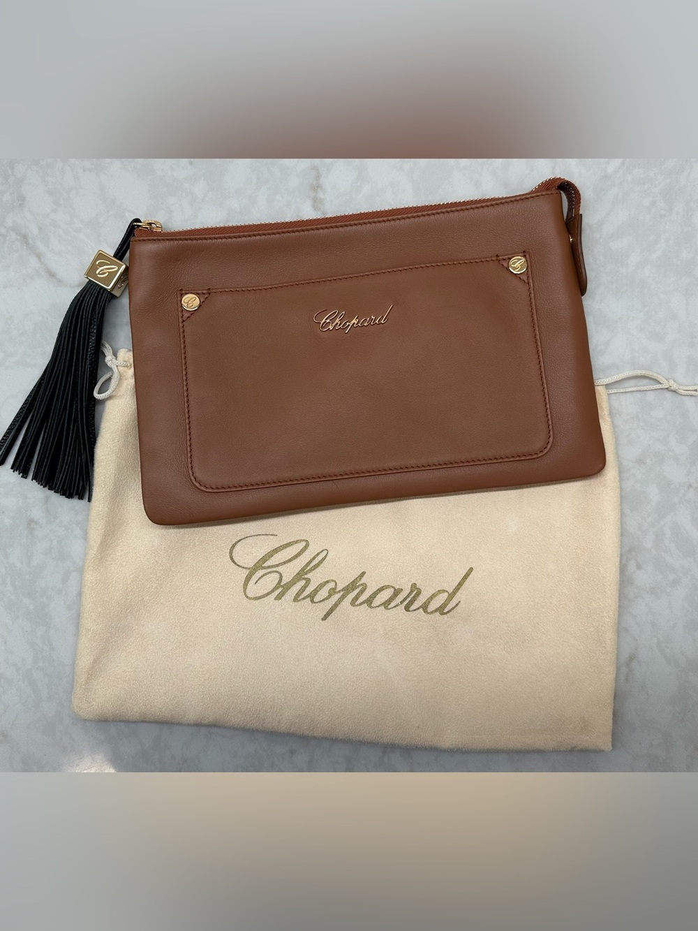 EUC Chopard Leather Clutch Bag in Saddle Color With Gold Hardware.